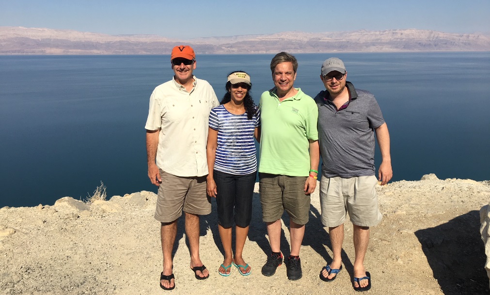 John is pictured with firm colleagues by the Dead Sea in Israel.