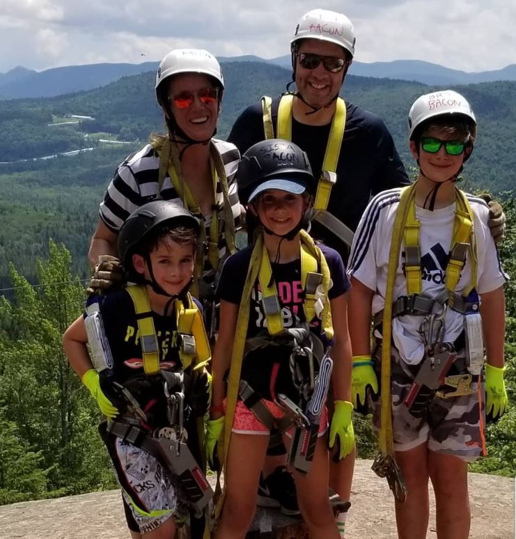 Rob Burger, Sterne Kessler COO seen with family in the mountains.
